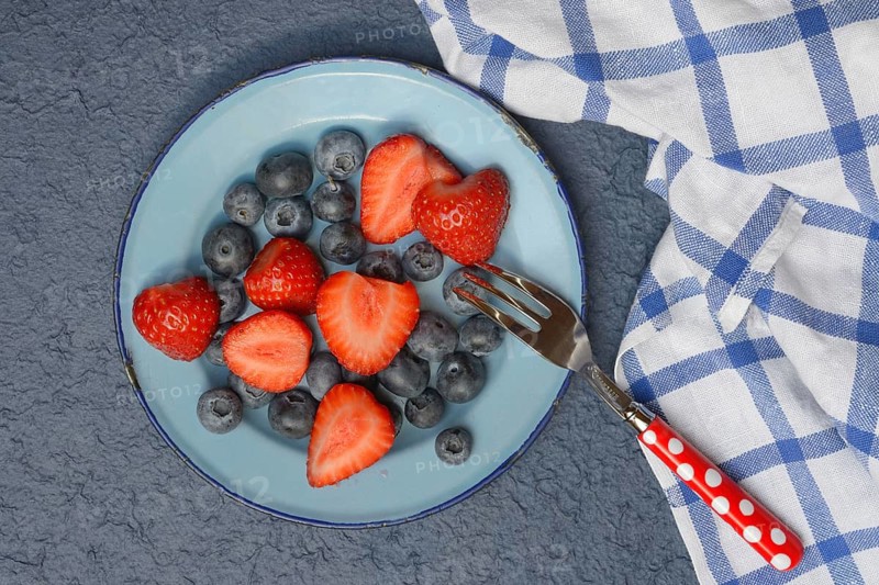 Plate with strawberries and blueberries, Fragaria, Vaccinium