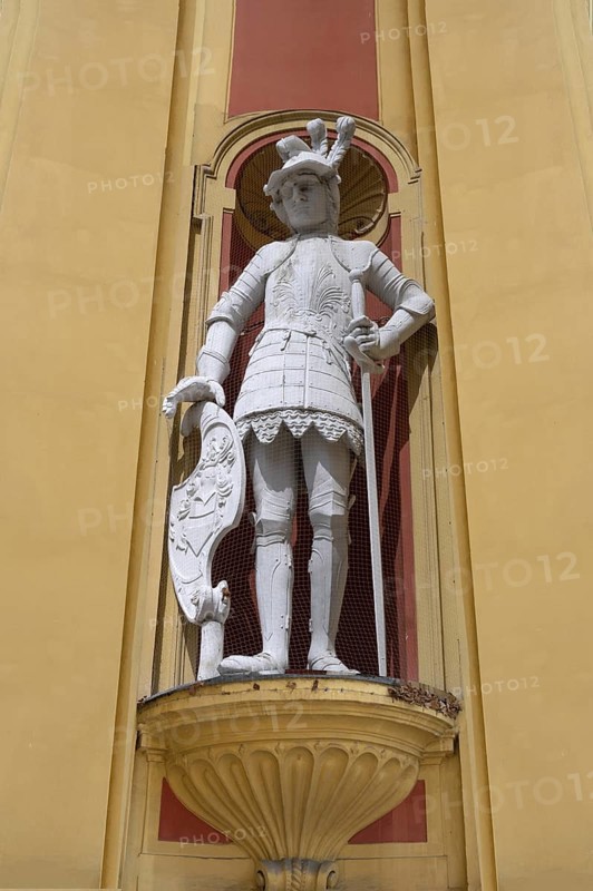 Sculpture of the giant Haymon, founder of the monastery, at the entrance portal of Wilten Abbey, Klostergasse 7, Wilten, Innsbruck, Austria