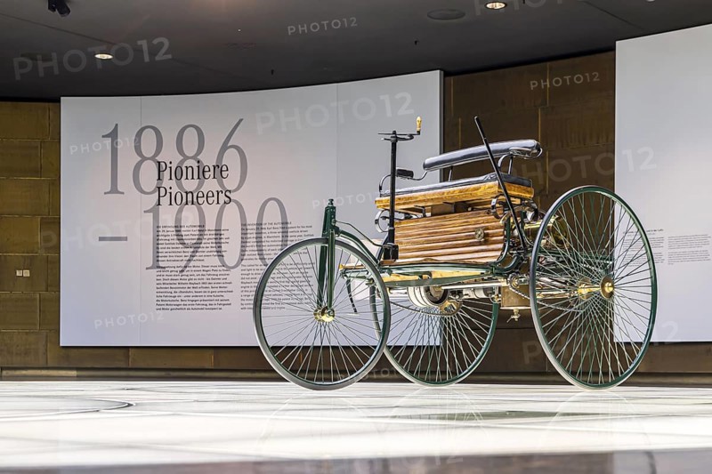 Benz Patent Motor Car from 1886 - the world's first petrol car. The Mercedes-Benz Museum in Stuttgart presents a journey through the automotive history of the global corporation. The history of the Mercedes star begins with the first automobile in 1886. 160 vehicles are on display. Stuttgart, Baden-Württemberg, Germany