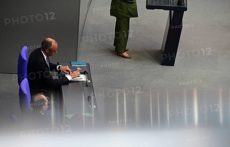 Federal Chancellor Friedrich Merz (CDU) and parts of his cabinet sit on the government bench, whilec, co-chair of the Greens parliamentary group, responds to the Federal Chancellor's government statement