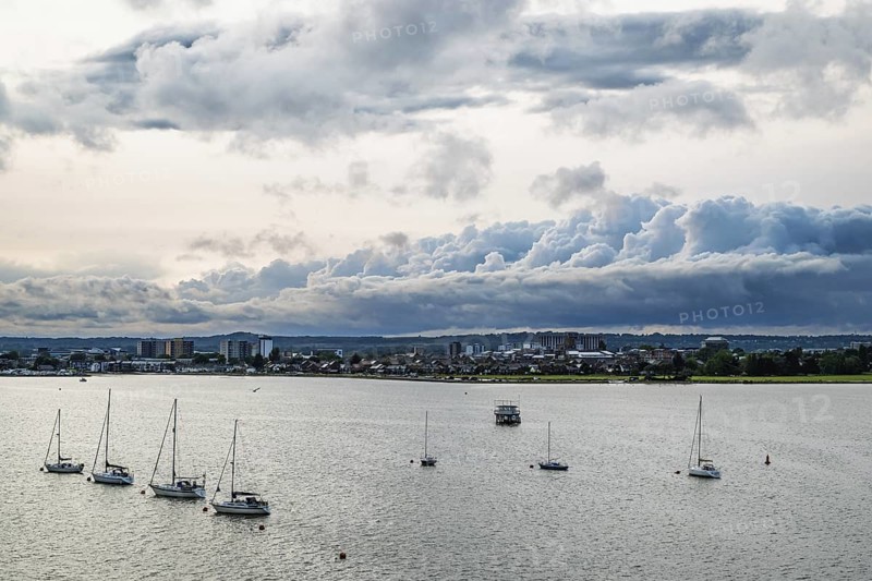 Yachts over Ramshorn Lake and Poole, Brownsea, Dorset, England, United Kingdom