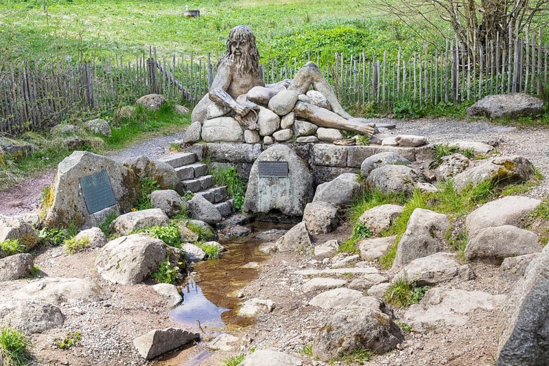 Figure of the river god Danuvius by sculptor Wolfgang Eckert at the source of the Breg, source of the Danube in Furtwangen in the Black Forest, Baden-Württemberg, Germany