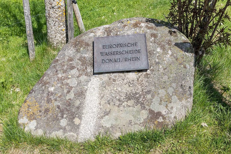 Signpost European watershed Danube and Rhine near the source of the Danube in Furtwangen in the Black Forest, Baden-Württemberg, Germany