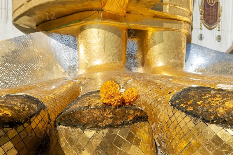 Feet of a 32 metre high standing Buddha decorated with glass mosaics and 24-carat gold, Luang Pho To or Phrasiariyametri, Wat Intharawihan, Bangkok, Thailand