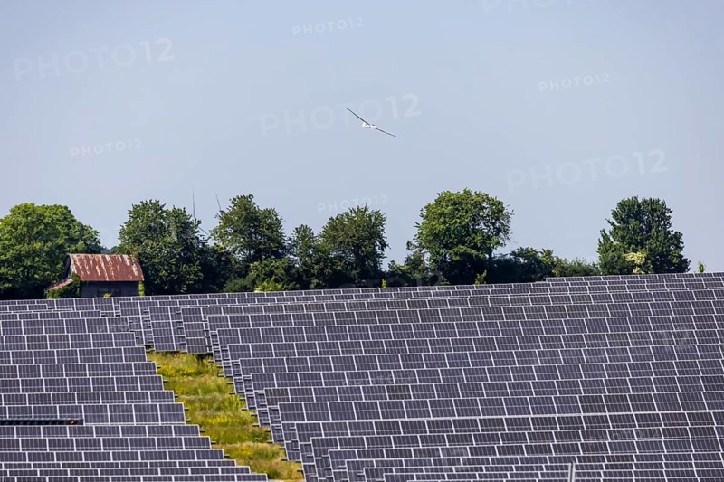 Open-space photovoltaic system, solar park near Nellingen in the Swabian Alb. Glider. Nellingen, Baden-Württemberg, Germany
