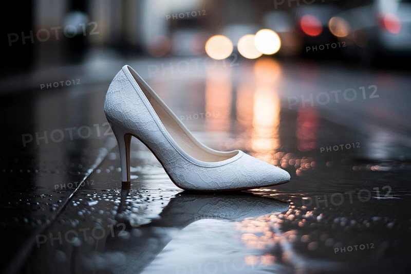 White lace wedding heel on rainy street. Symbol of a ruined wedding or runaway bride. Generative ai, AI generated
