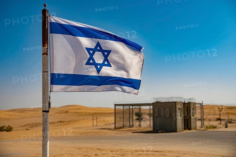 Israeli flag waving in desert wind near military checkpoint under harsh sunlight. Generative ai, AI generated