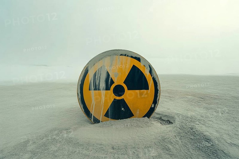 Round radiation warning sign in scorched earth. Symbol for danger of nuclear war and environmental decay. Generative ai, AI generated