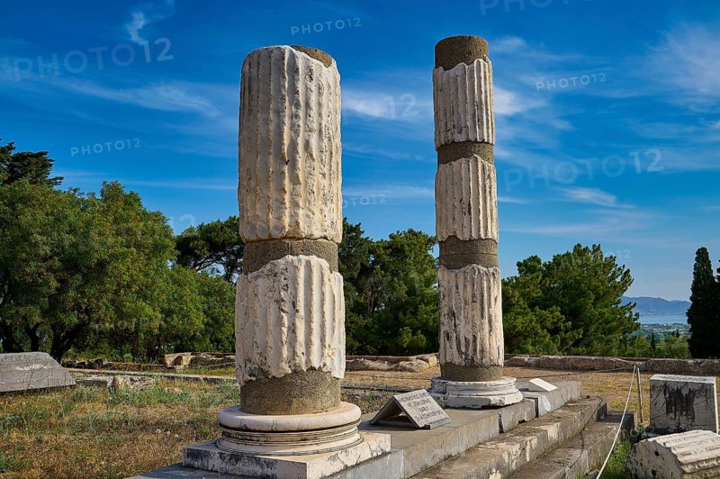 Two Doric columns in the middle of an ancient ruined landscape, Ionian Asclepion temple, Asclepion, Asclepieion, healing temple, temple, Hippocrates, Kos, Dodecanese, Greek Islands, Greece