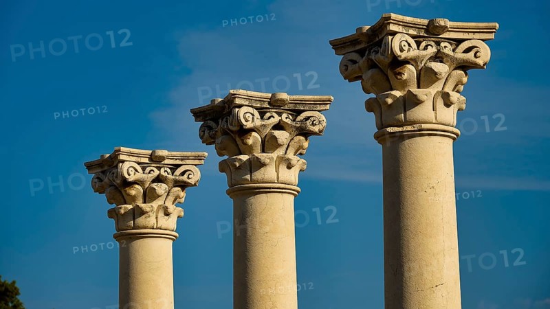 Three ancient columns with ornate capitals against a clear blue sky, Temple of Apollo, Corinthian Columns, Asklipion, Asklepieion, Healing Temple, Temple, Hippocrates, Kos, Dodecanese, Greek Islands, Greece