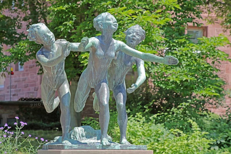 Three-river fountain by Emil Salm 1935 as a symbol for three-river city, three, rivers, city, bronze sculpture, verdigris, jump, dance, joy, fun, joyful, rejoice, cheer, shout, scream, gesture, arms, outstretched, detail, fountain, Blumenhof, Pforzheim, Northern Black Forest, Black Forest, Baden-Württemberg, Germany