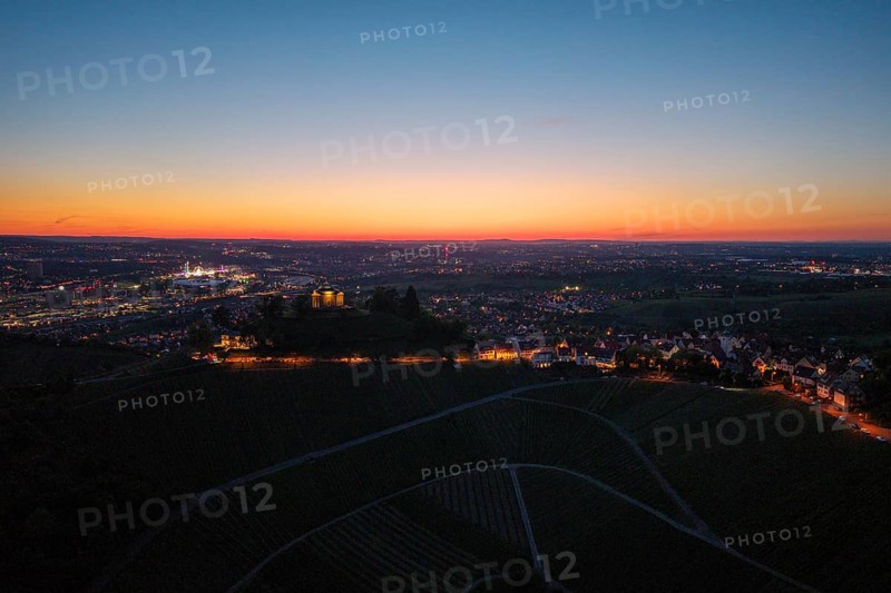 Expansive city view at dusk, with illuminated chapel and vineyards, grave chapel, Zum Württemberg, Rotenberg district, Stuttgart, Baden-Württemberg, Germany