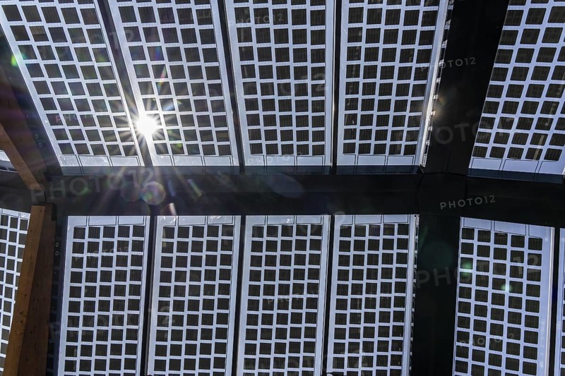 Transparent solar roof of the electric charging station on the site of the former Lohberg colliery in Dinslaken, operated by Fastned, uses electricity from wind and solar power, fast-charging stations, North Rhine-Westphalia, Germany