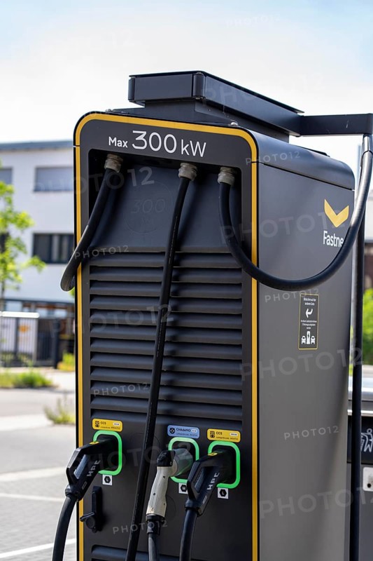 Electric charging station on the site of the former Lohberg colliery in Dinslaken, operated by Fastned, uses electricity from wind power and solar energy, fast-charging columns, with its own solar roof, Lohberg, North Rhine-Westphalia, Germany