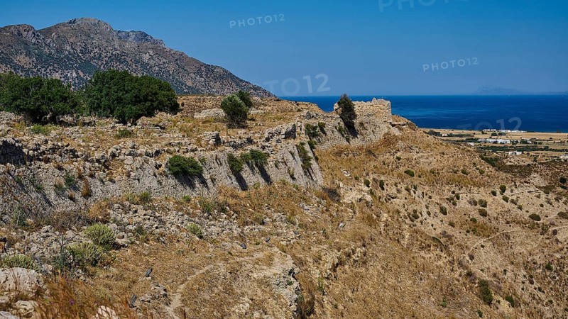 Rocky ruins on a coastal landscape with sea and sunny sky, Kardamina, Antimacheia, Medieval fortress, St John's fortress, Antimachia, Kos, Dodecanese, Greek Islands, Greece
