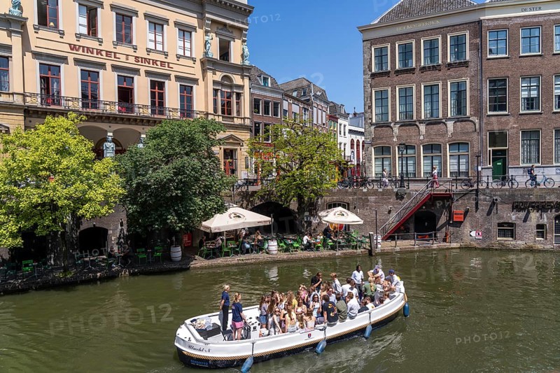 The old town centre of Utrecht, Oudegracht, around 2 km long with many old houses, shops, restaurants directly on the canal, many bridges, boat traffic of all kinds, canal cruise, Netherlands