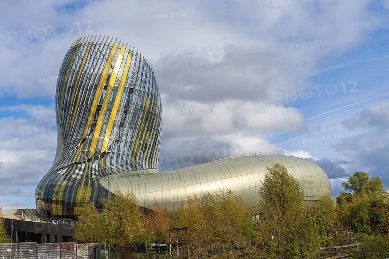 The cité du vin museum in bordeaux, france, showcases the city's rich wine heritage with its striking modern architecture