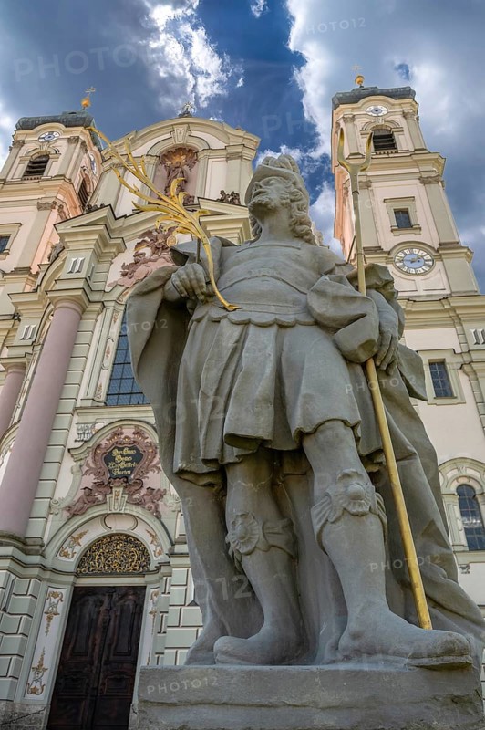 Sculpture of the church patron St Theodore in front of the east tower of the baroque Basilica of St Alexander and St Theodore, Ottobeuren Monastery, Ottobeuren, Unterallgäu, Bavaria, Germany