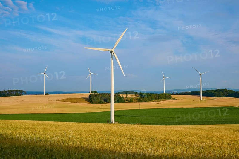 Wind turbines in a wide, green landscape under a clear sky, summer, Höhefeld, Wertheim, Baden-Württemberg, Germany