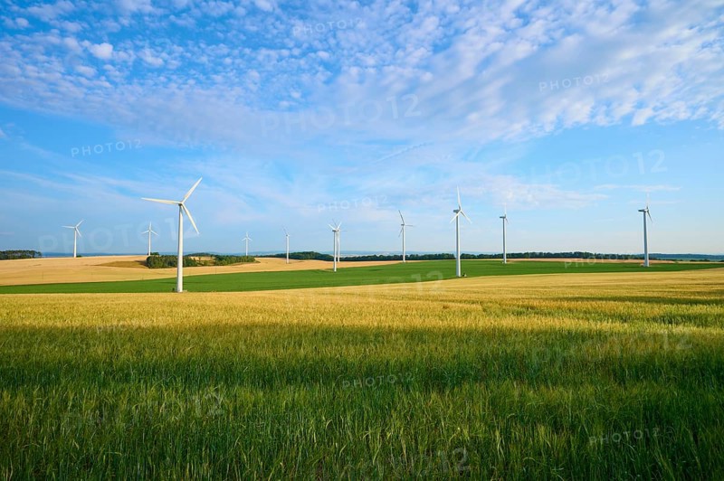 Wind turbines in a wide, green landscape with blue sky, summer, Höhefeld, Wertheim, Baden-Württemberg, Germany