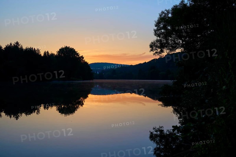 Twilight steals over a quiet river Main, whose water reflects the soft colours of the sky, summer, Grünenwört, Wertheim, Main, Main-Tauber-Kreis, Baden-Württemberg, Germany