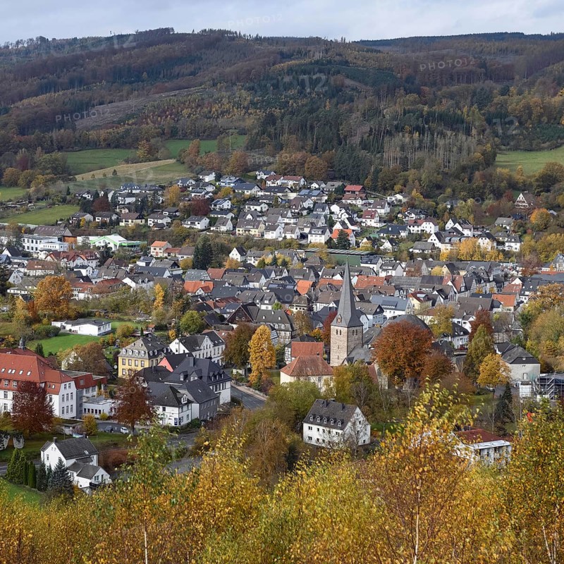 View over Balve in the Märkischer Kreis, a picturesque town in the Sauerland, view from the Pius Chapel to the town centre in late autumn. Balve is known throughout the region for the largest cultural cave in Europe and the large equestrian tournaments that take place regularly, town in Sauerland, North Rhine-Westphalia, Germany, Western Europe