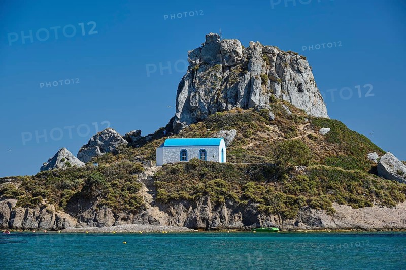 Top of a rocky island with chapel and blue roof, Agios Stefanos Beach, Agios Stefanos Basilica, Chapel of Agios Nikolaos, Kastri Island, Kos, Dodecanese, Greek Islands, Greece