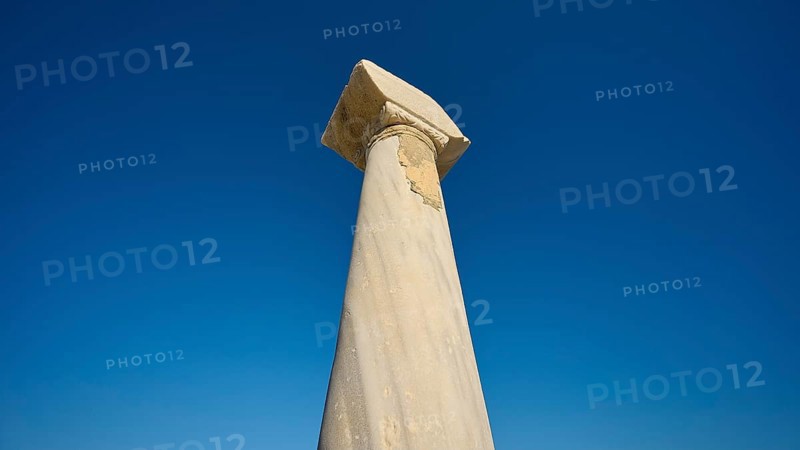 Ancient column imposing against deep blue sky, Agios Stefanos Beach, Agios Stefanos Basilica, Chapel Agios Nikolaos, Kastri Island, Kos, Dodecanese, Greek Islands, Greece