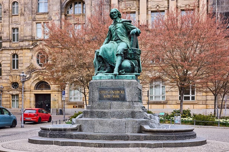 Monument to Otto von Guericke, sandstone building, public order office, bare winter trees, parking lane with vehicles, old town, street Bei der Hauptwache, Magdeburg, state capital, independent city, Saxony-Anhalt, Germany