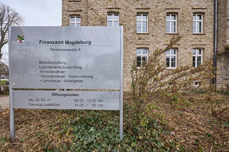 Tax office sign, tax audit, external wage tax audit, registration tax, sales tax, wage tax for employers, sandstone building, diffuse light, cloudy, Tessenowstraße, Magdeburg, state capital, independent city, Saxony-Anhalt, Germany
