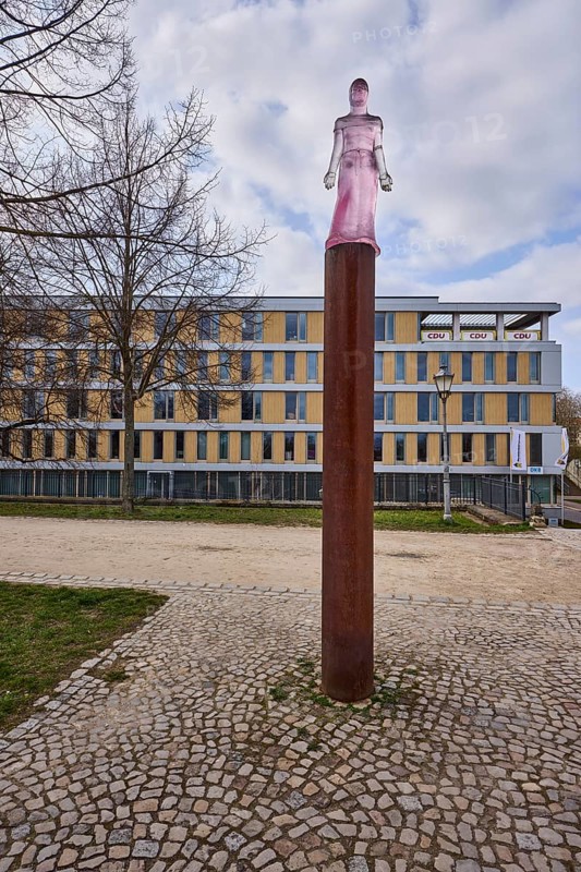 Mechthild von Magdeburg, sculpture, transparent plastic, sculptor Susan Turcot, lawn, bare winter trees, pavement made of cobblestones, general architecture, diffuse light, cloudy, Fürstenwall, Magdeburg, state capital, independent city, Saxony-Anhalt, Germany