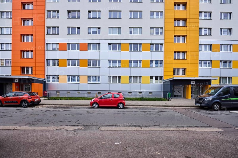 High-rise buildings, residential building, façade, window, car park with vehicles, diffuse light, Pablo-Neruda-Straße, Magdeburg, state capital, independent city, Saxony-Anhalt, Germany