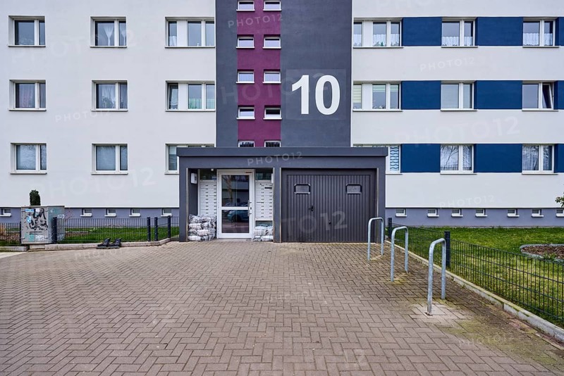 High-rise building, residential building, façade, entrance area, window, door, house number, diffuse light, Salvador-Allende-Straße, Magdeburg, state capital, independent city, Saxony-Anhalt, Germany