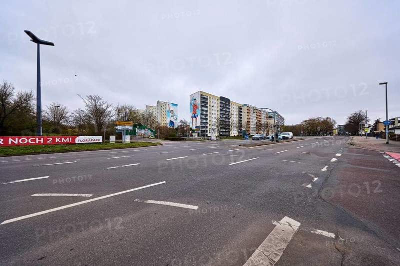 High-rise buildings, residential buildings, residential silos, lantern, asphalt road, lane markings, diffuse light, cloudy, intersection Ebendorfer Chaussee with access to Magdeburger Ring, Magdeburg, state capital, independent city, Saxony-Anhalt, Germany