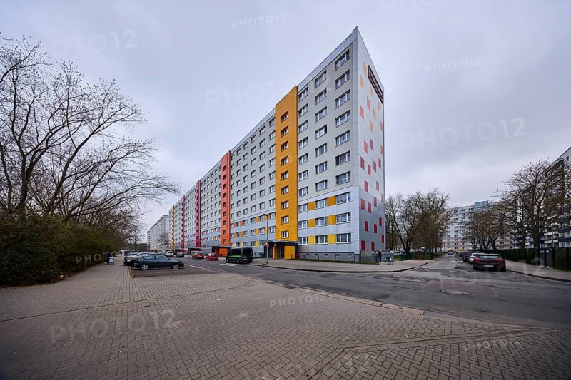 High-rise buildings, residential buildings, residential silos, facade, windows, car park with vehicles, bare winter trees, intersection of Pablo-Neruda-Straße and Victor-Jara-Straße, Magdeburg, state capital, independent city, Saxony-Anhalt, Germany