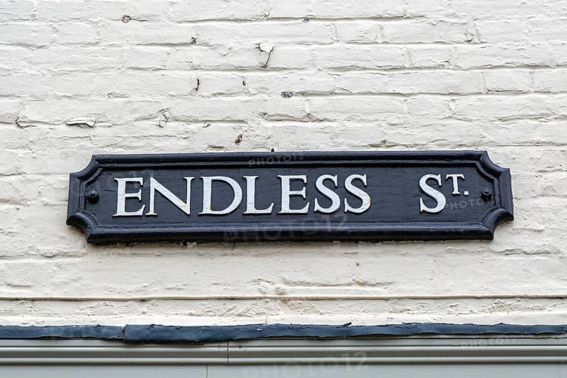 Sign on wall for Endless Street, Salisbury, Wiltshire, England, UK