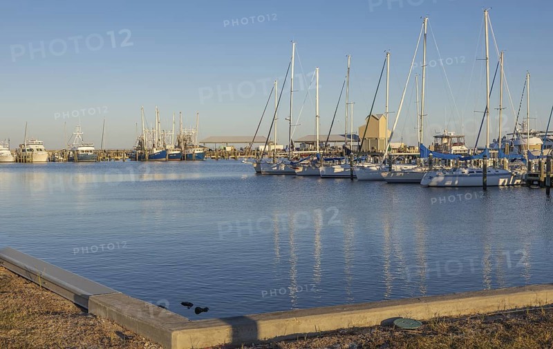 Sailboats and commercial shrimp boats in the harbor at Pass Christian, Mississippi