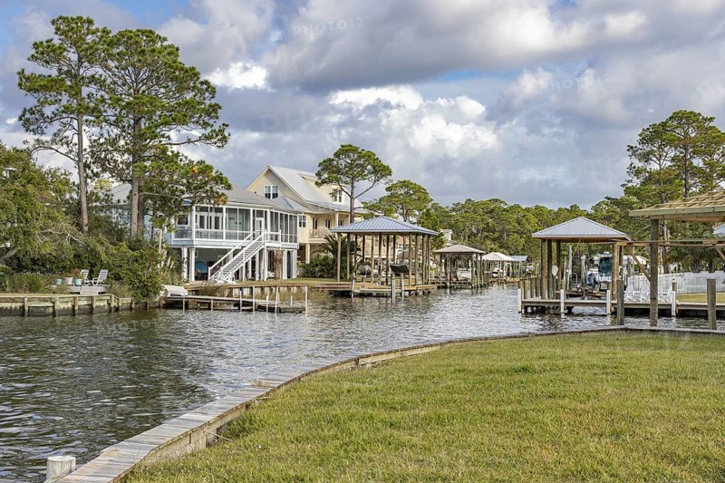 Waterfront homes with boat docks and boat lifts in the community of Timber Ridge in Pass Christian, Mississippi