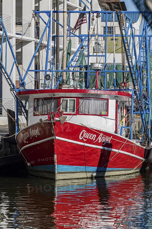 Commercial fishing boat Queen Angel at dock in the commercial section of the Biloxi Small Craft Harbor in Biloxi, MS
