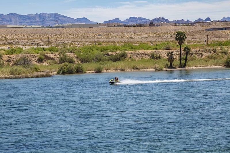 Tourists riding jet skis on the Colorado River in Laughlin, Nevada