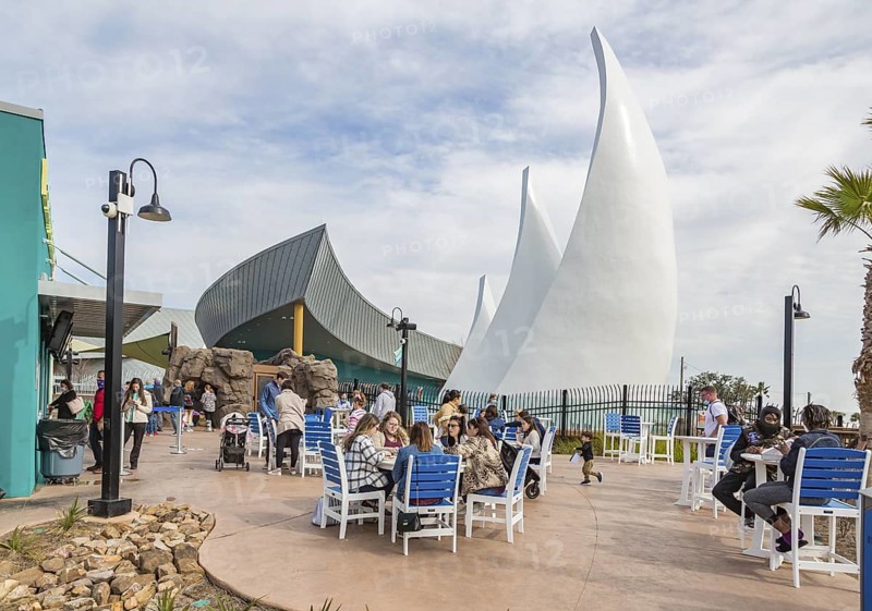 Visitors eating at the Pelican Pointe Cafe in the Mississippi Aquarium on the gulf coast at Biloxi, Mississippi