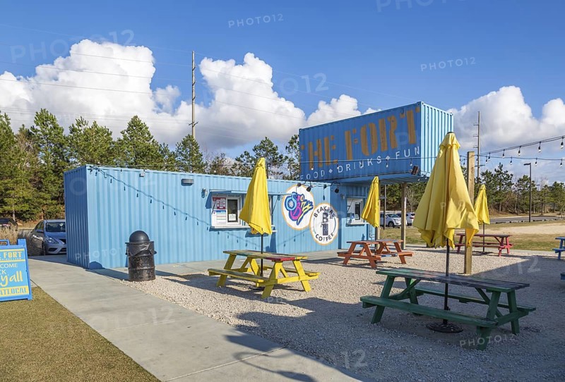 Breakers Coffee shop and Sno Biz are just two businesses within The Fort outdoor dining and entertainment hangout composed of repurposed shipping containers in Spanish Fort, Alabama, USA