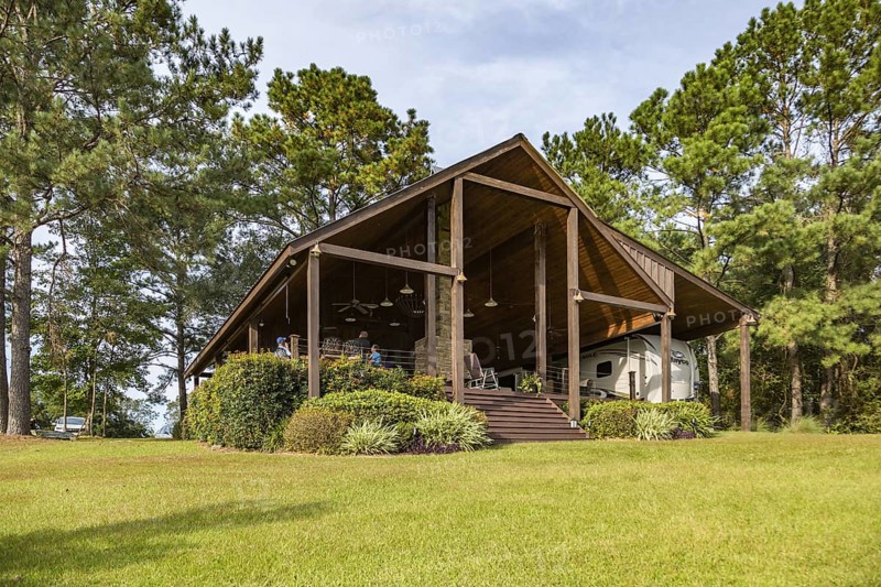 Residential pavilion with recreational vehicle cover in rural area near Hattiesburg, Mississippi