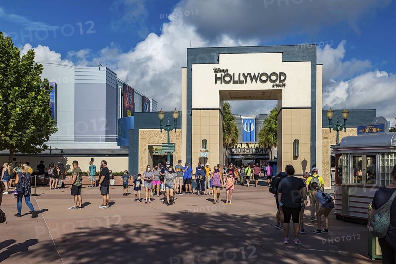 Entrance to Disney's Hollywood Studios theme park with sign mandating masks to contain the spread of Covid 19 virus pandemic
