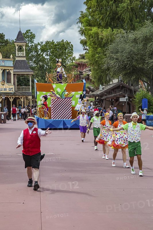Parade of dancers and characters in the Frontierland area of Magic Kingdom at Walt Disney World, Orlando, Florida