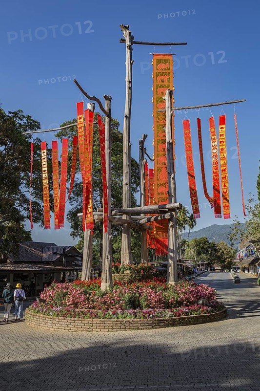 Lanna flags display celebrates cultural history inside the Doi Tung tourist attraction in Chiang Rai, Thailand