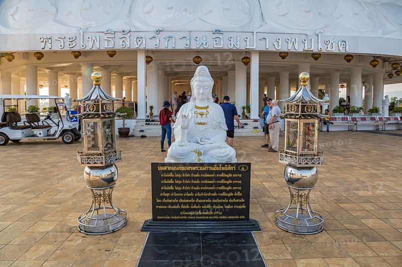 Buddhist shrine at the base of the Guan Yin (Goddess of Mercy) statue at Wat Huay Pla Kang Temple in Chiang Rai province of Northern Thailand