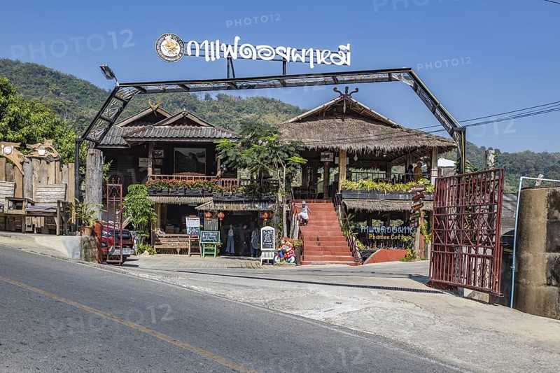 Sign on outdoor bench at the Doi Phamee coffee shop and restaurant in Mae Sai district of Chiang Rai, Thailand