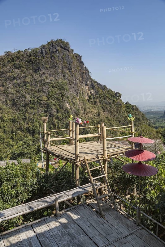 Bamboo overlook platform provides unobstructed view of the hillside at Pha Mi Village in Mae Sai district of Chiang Rai, Thailand