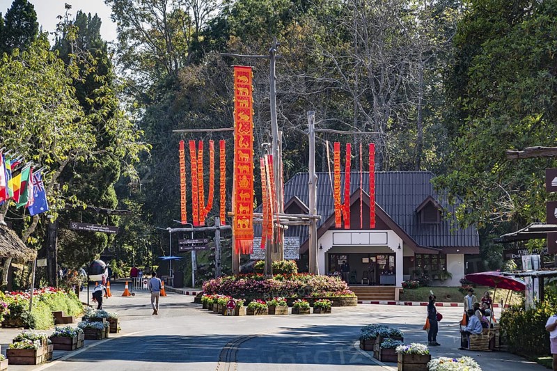 Lanna flags display celebrates cultural history inside the Doi Tung tourist attraction in Chiang Rai, Thailand